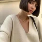 Sleek-Espresso-French-Bob-with-Eye-Grazing-Bangs.webp