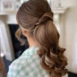 Soft-Rolled-Half-Up-Style-with-Bouncy-Prom-Curls.webp